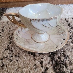 Elegant Iridescent Teacup and Saucer Set